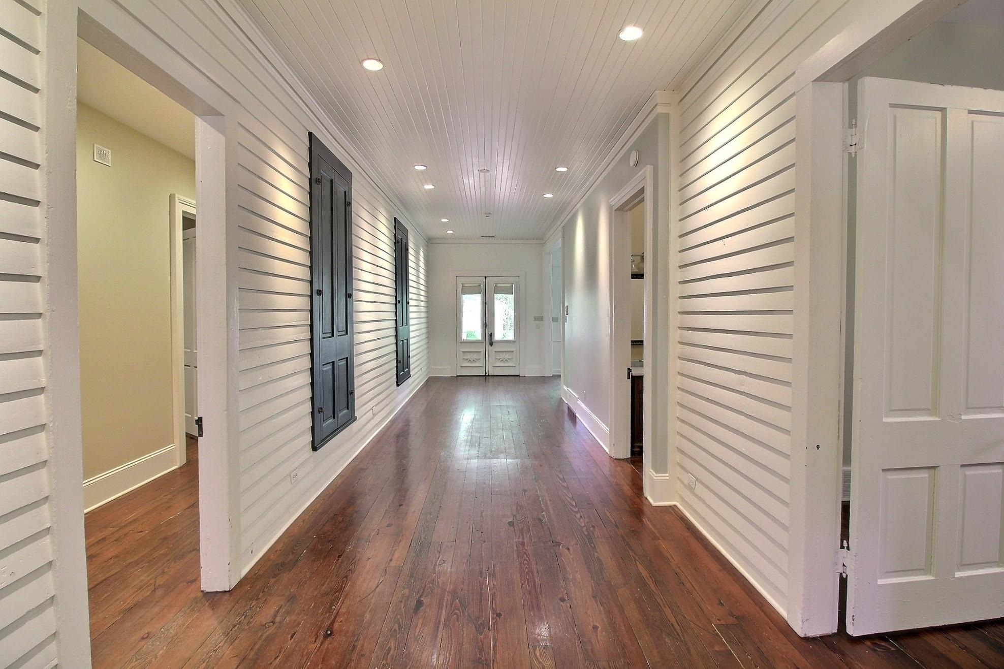 348 North Rowlett Street Collierville, TN 38017 - Photo 7 of 39 a view of gallery with wooden floor