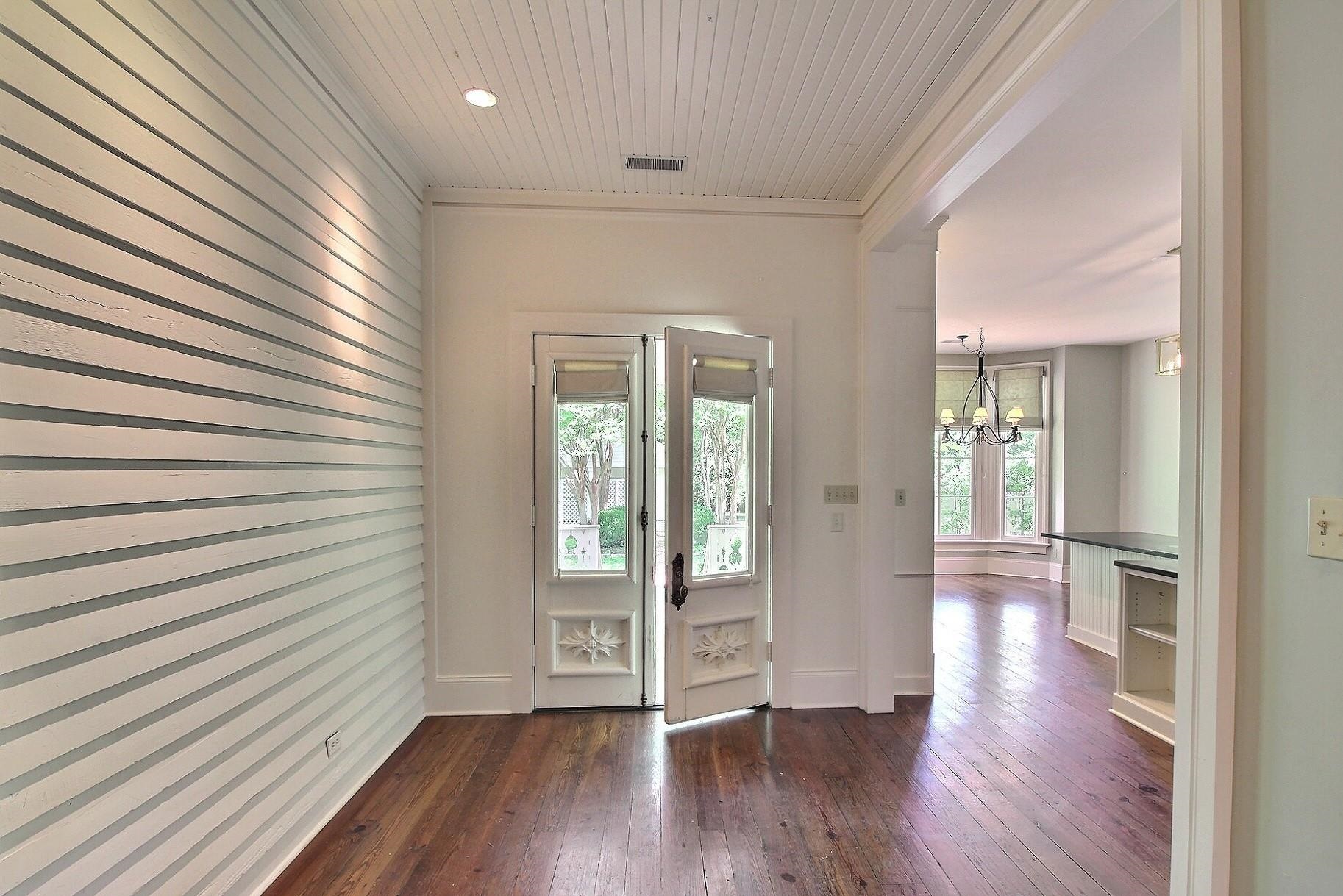 348 North Rowlett Street Collierville, TN 38017 - Photo 8 of 39 a view of a hallway with wooden floor