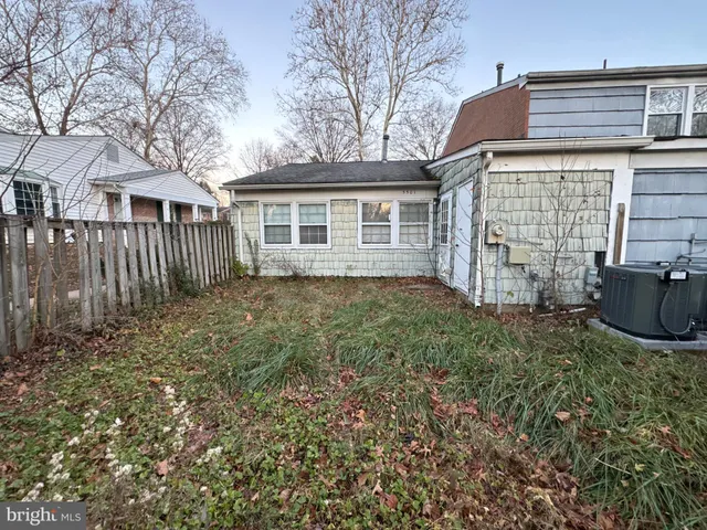 front view of a house with a garden