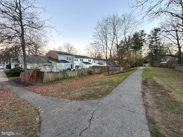a view of a town with barn house