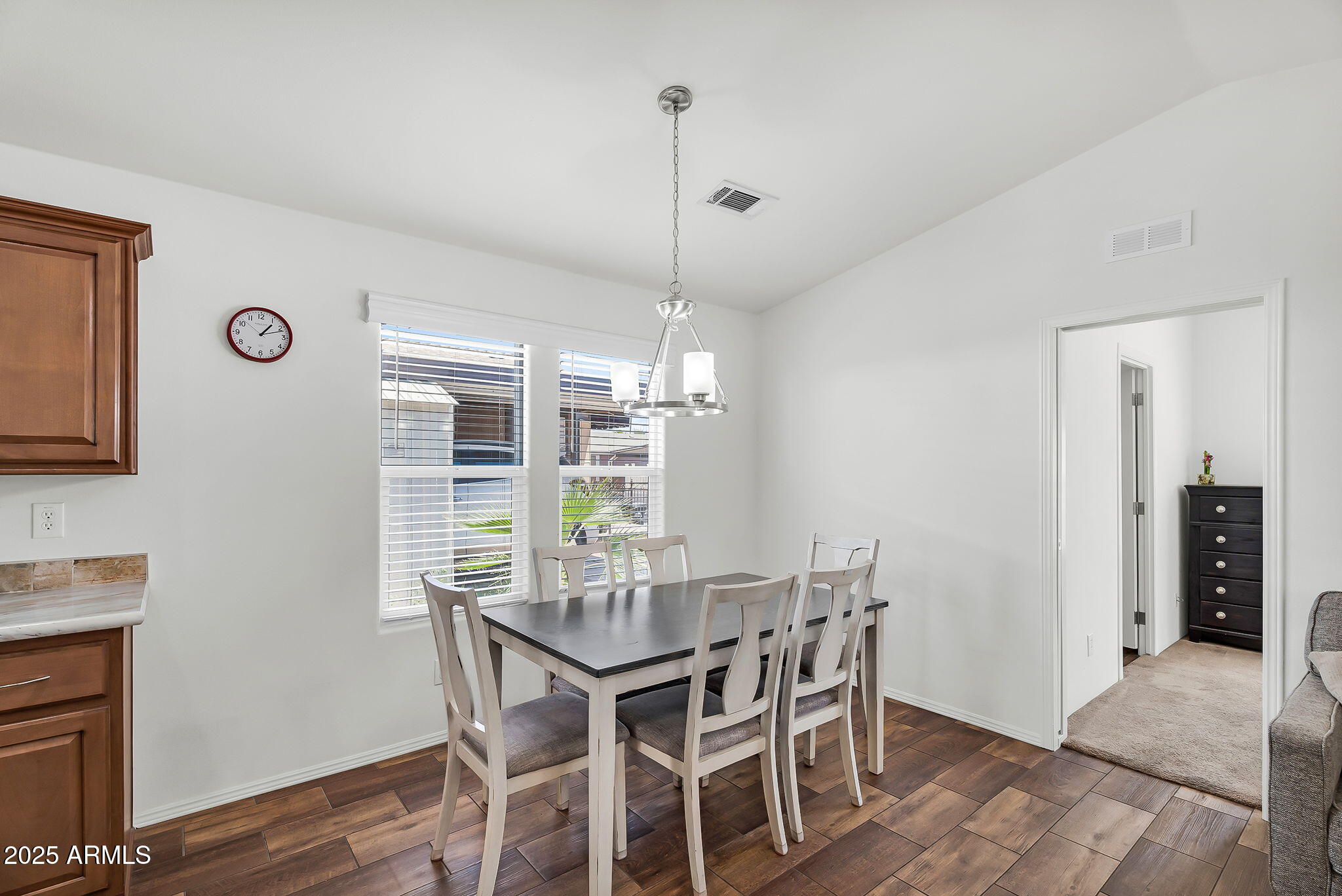 8865 East Baseline Road, Unit 802 Mesa, AZ 85209 - Photo 7 of 44 a dining room with furniture and window
