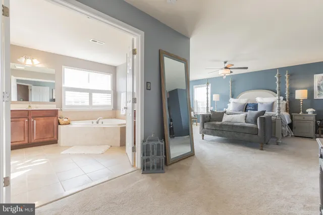 a large room with a couch and a view of living room