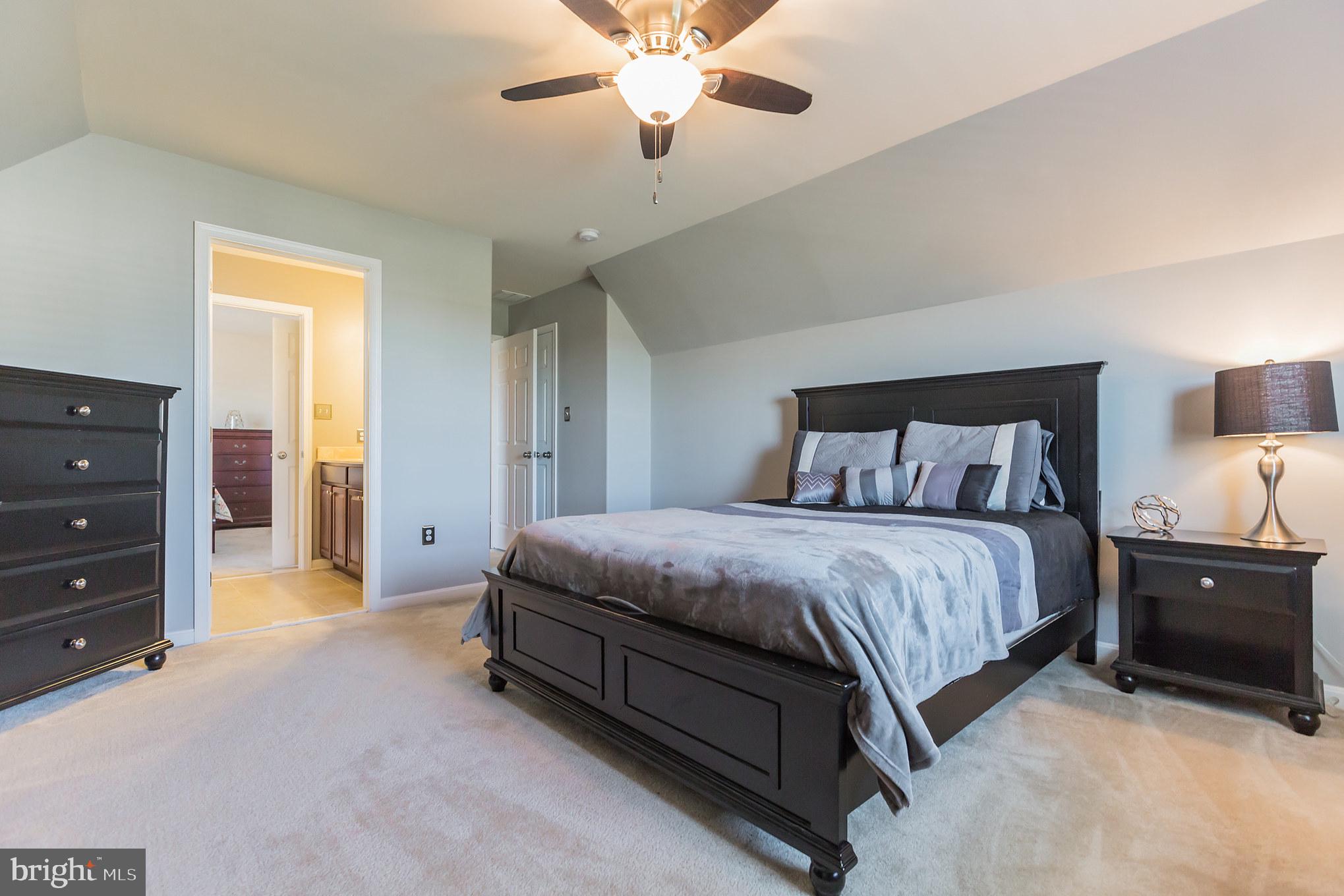 5 A Little Baltimore Road Newark, DE 19711 - Photo 21 of 27 a spacious bedroom with a bed and window