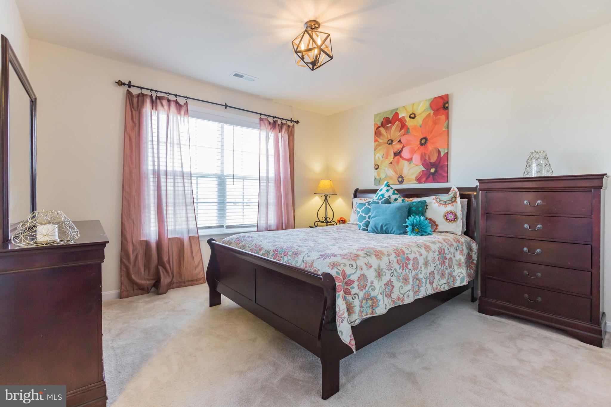 5 A Little Baltimore Road Newark, DE 19711 - Photo 23 of 27 a bedroom with a bed and a window