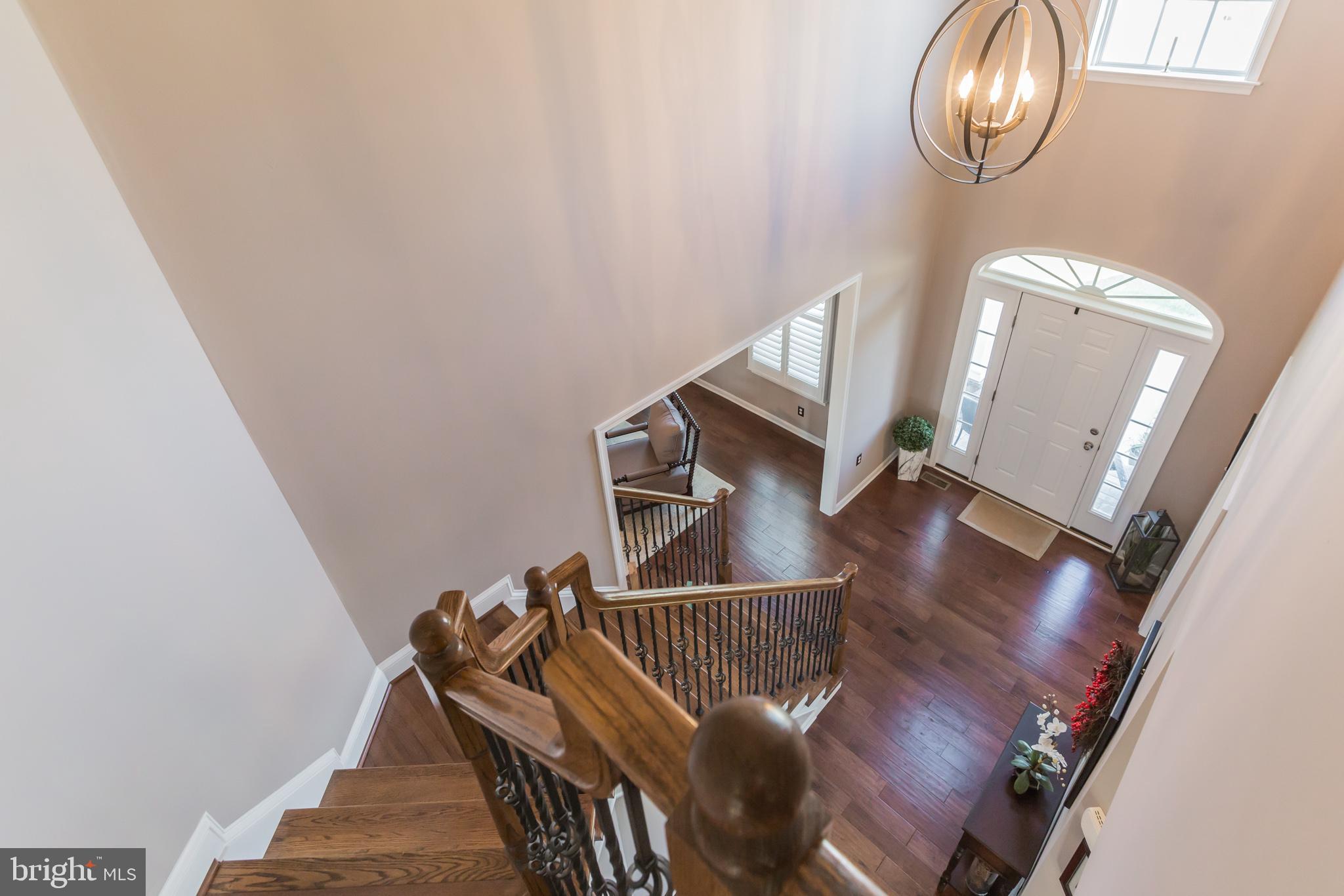 5 A Little Baltimore Road Newark, DE 19711 - Photo 4 of 27 a view of entryway and hall with wooden floor