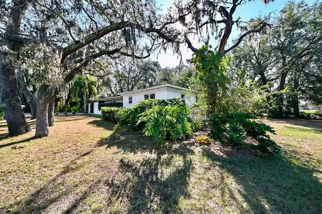 a view of house with outdoor space