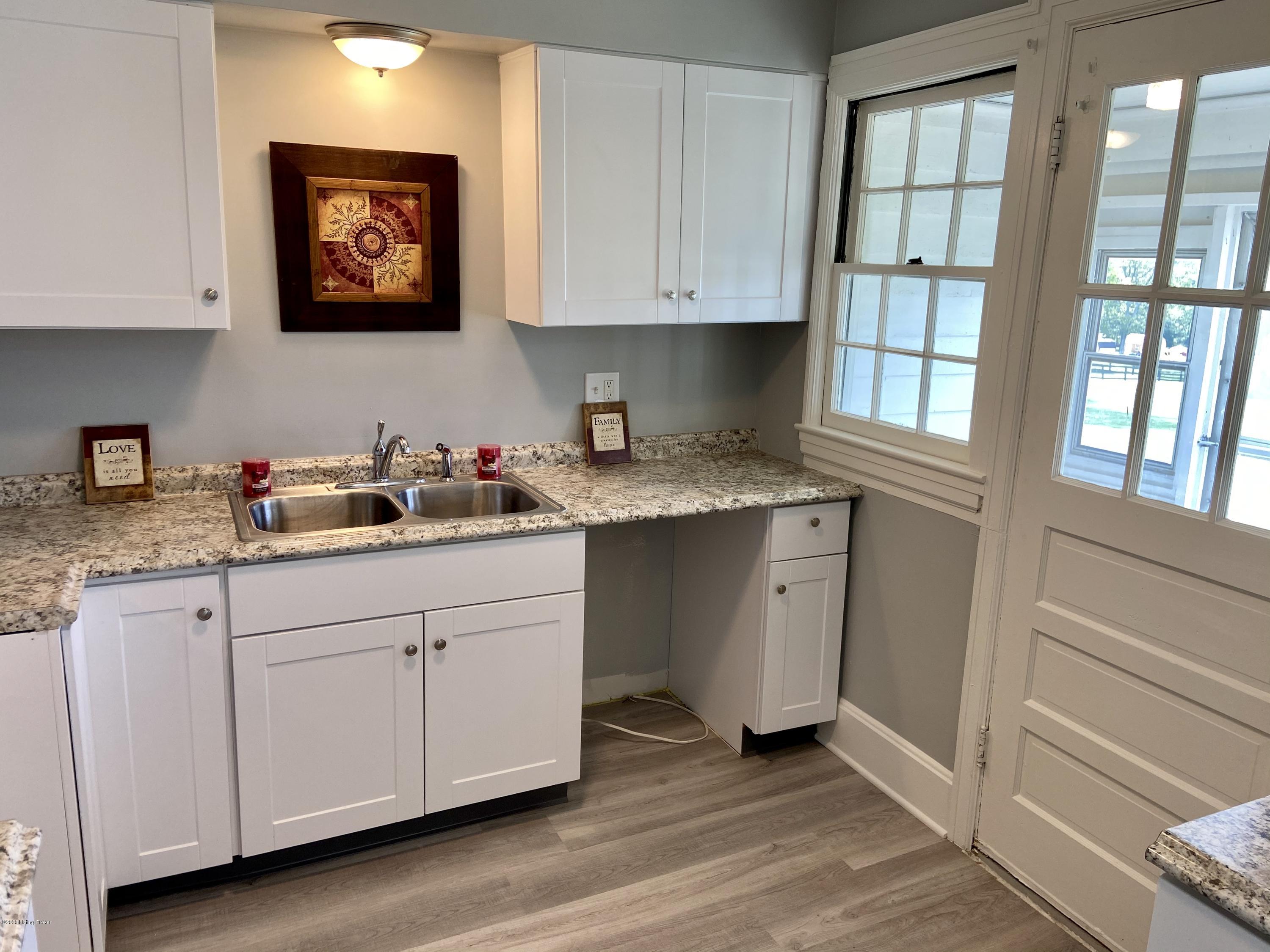 129 Spring Street New Castle, KY 40050 - Photo 14 of 53 NEW flooring in kitchen