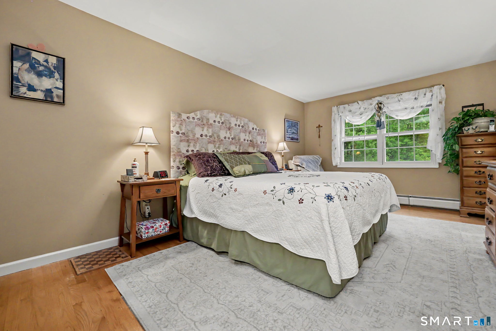 571 Wheeler Road Monroe, CT 06468 - Photo 24 of 40 a bedroom with a bed and a window