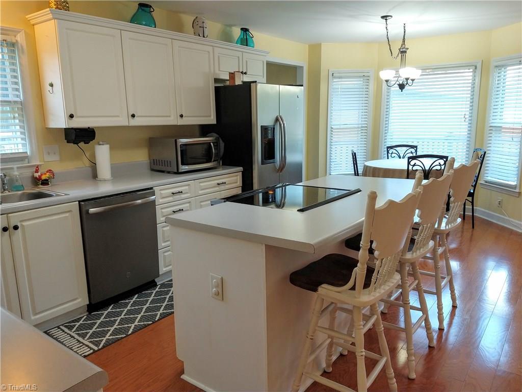 3660 Old Mountain Road Trinity, NC 27370 - Photo 8 of 29 Kitchen with an island for cooking and entertaining guest! Breakfast Nook perfect for Sunday Brunch!