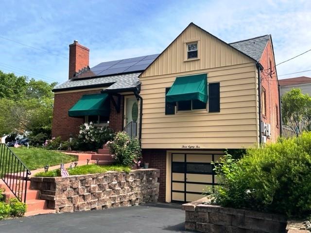 385 Rockhill Road Pittsburgh, PA 15243 - Photo 1 of 23 a front view of a house with a yard