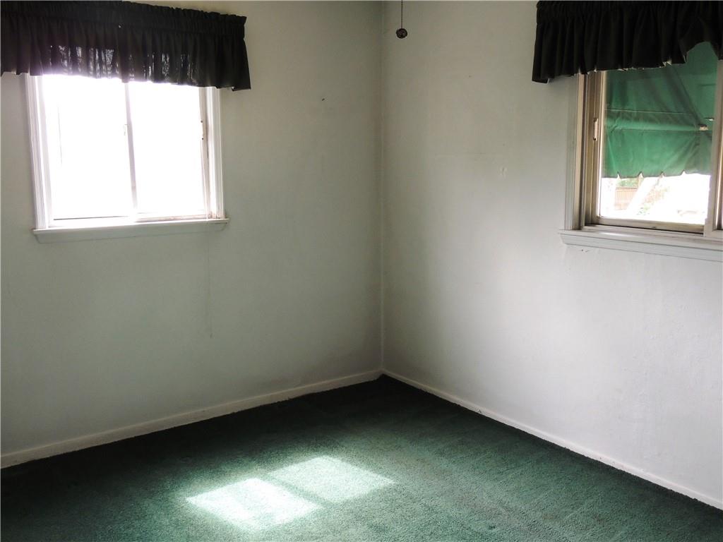 385 Rockhill Road Pittsburgh, PA 15243 - Photo 11 of 23 an empty room with a window