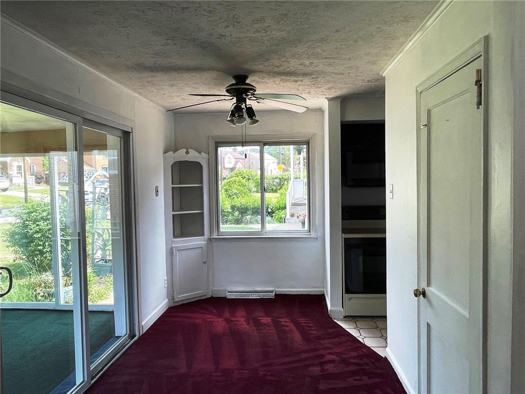 385 Rockhill Road Pittsburgh, PA 15243 - Photo 3 of 23 a view of empty room with window and wooden floor