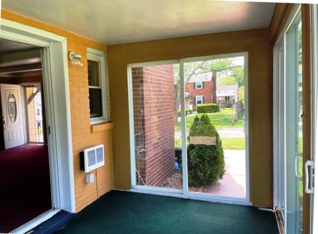 385 Rockhill Road Pittsburgh, PA 15243 - Photo 6 of 23 a front view of a house with a porch