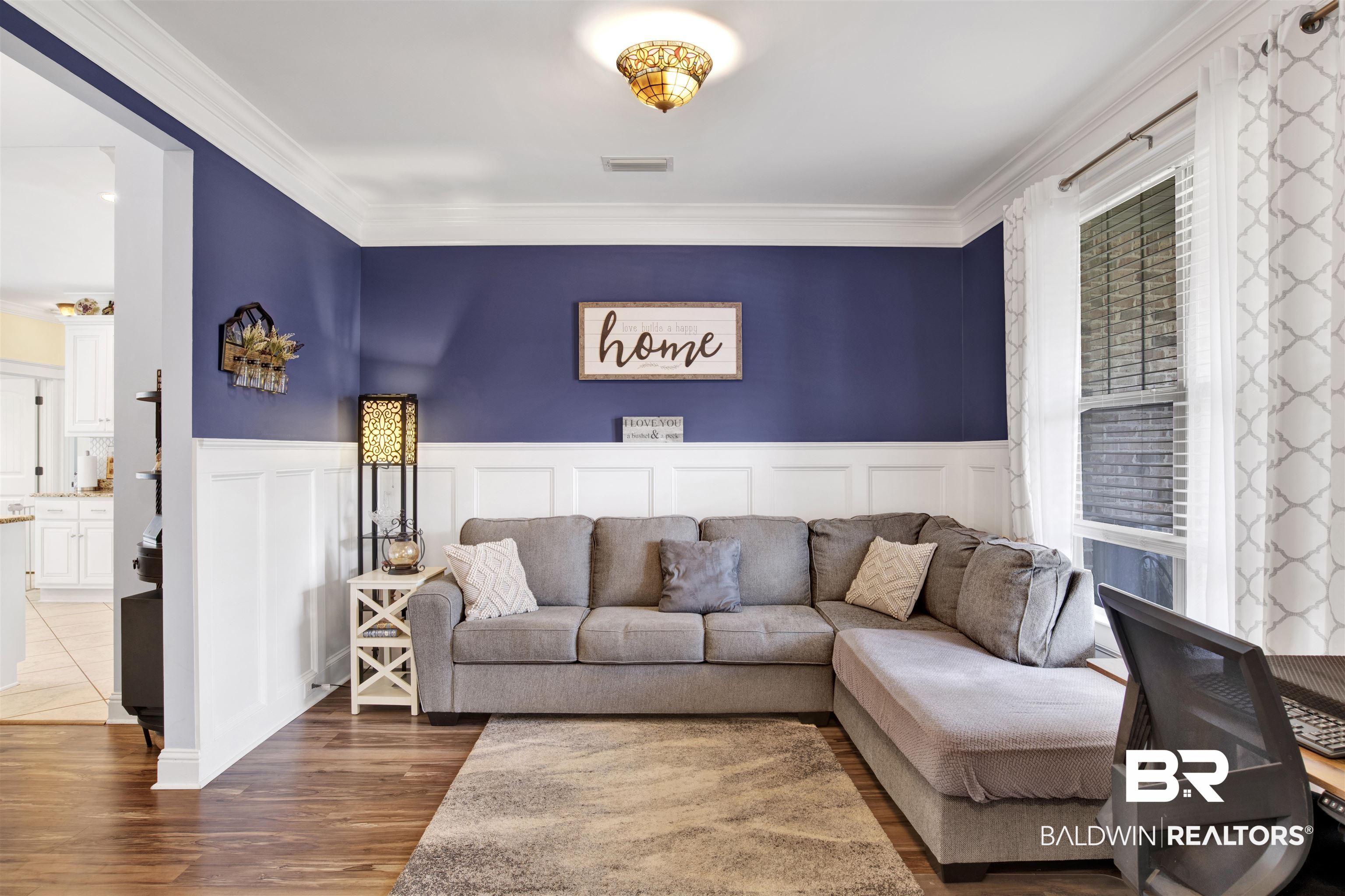 12418 Cambron Trail Daphne, AL 36527 - Photo 15 of 44 Living room with dark hardwood / wood-style floors and crown molding