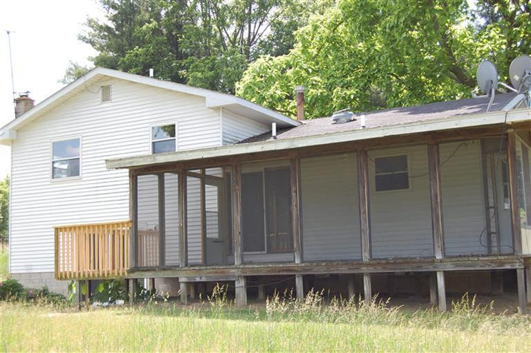 13001 Hadley Road Gregory, MI 48137 - Photo 14 of 14 Screened porch with new screening.
