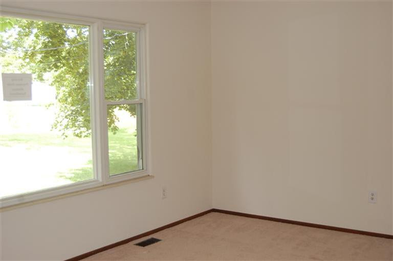 13001 Hadley Road Gregory, MI 48137 - Photo 4 of 14 Living room with new carpeting.