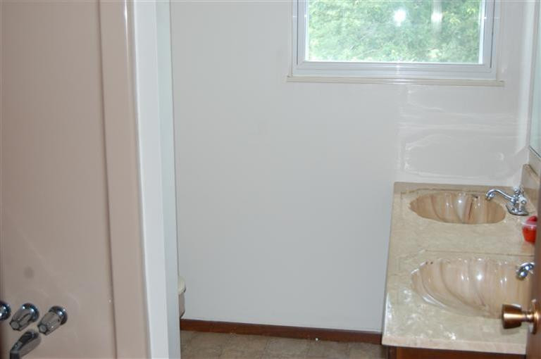 13001 Hadley Road Gregory, MI 48137 - Photo 7 of 14 Bathroom with new vinyl flooring.