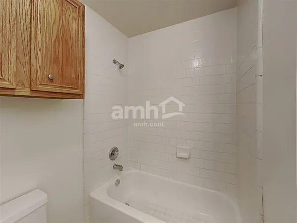 a bathroom with a bathtub