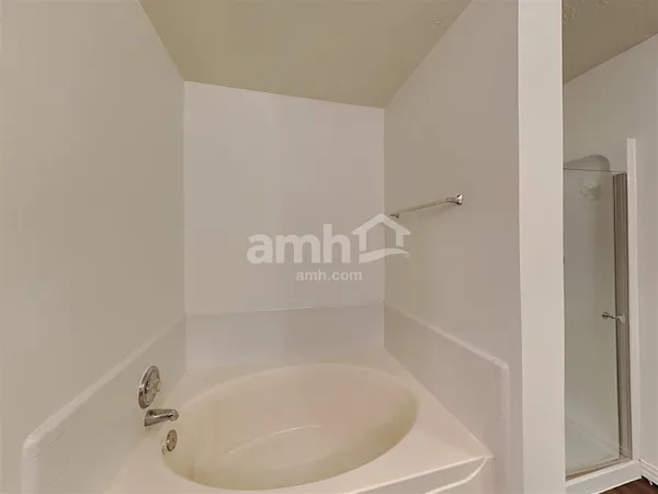 a close view of a bathtub in bathroom