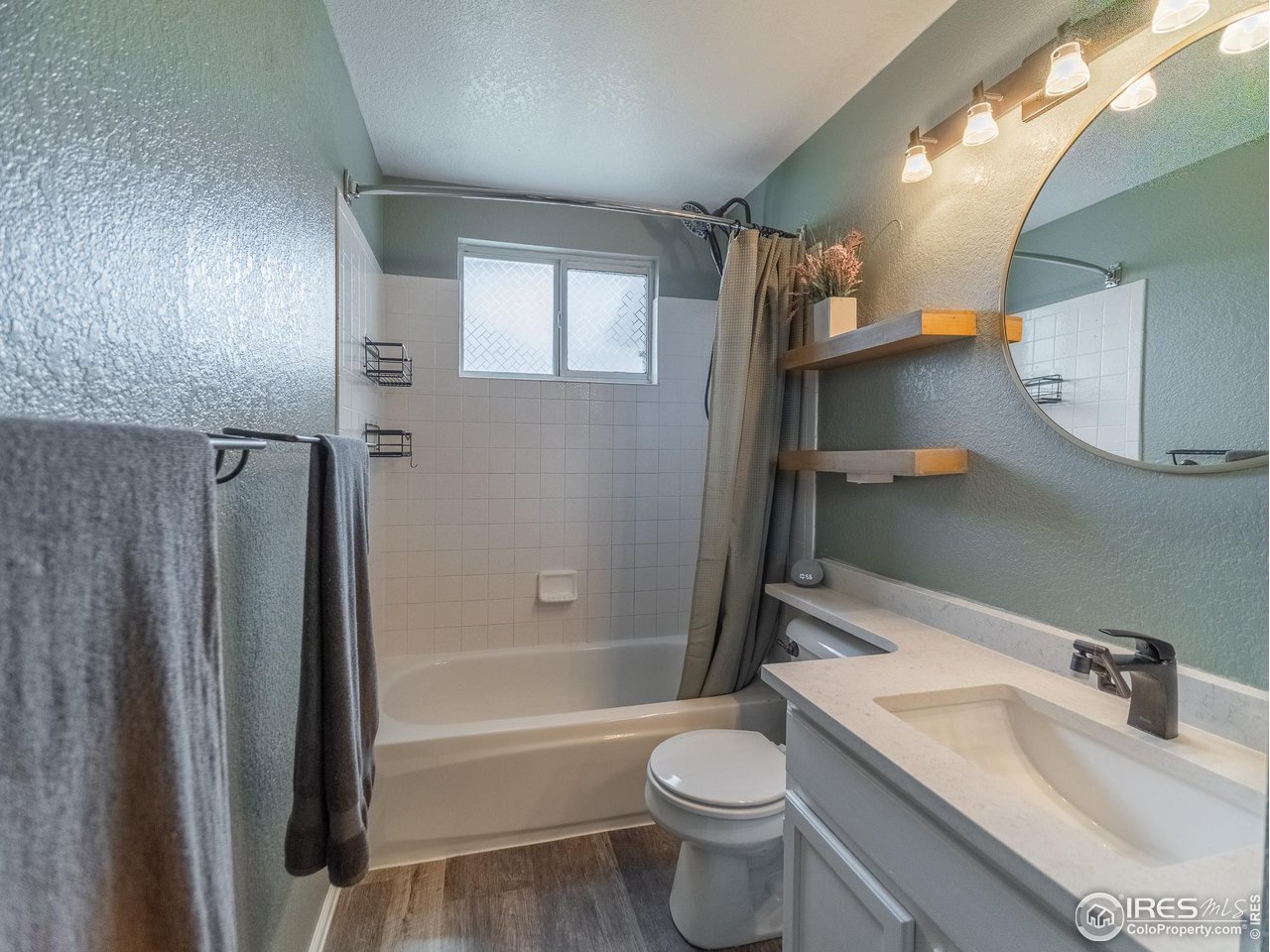 13146 Raritan Court Denver, CO 80234 - Photo 25 of 41 a bathroom with a sink toilet and shower