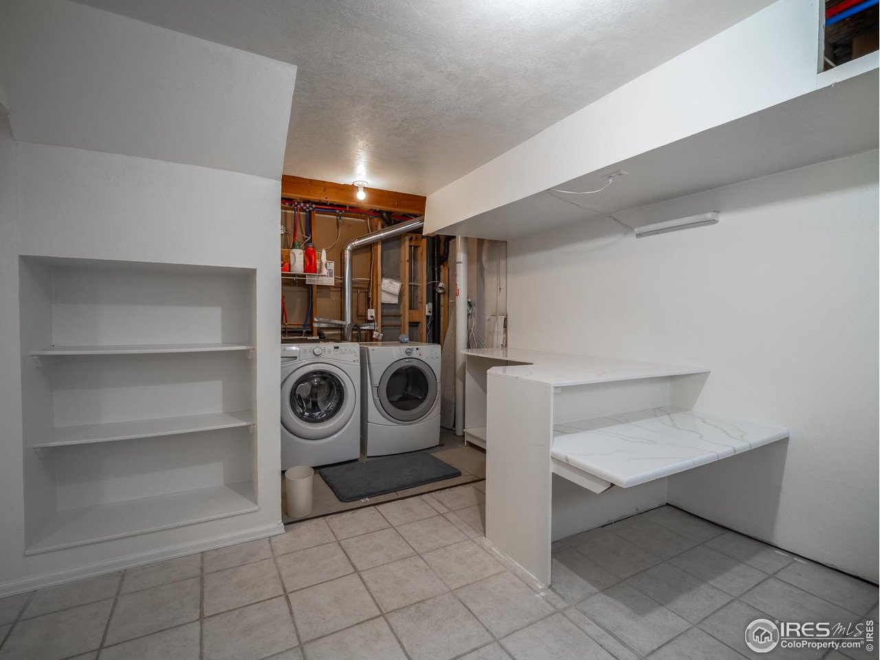 13146 Raritan Court Denver, CO 80234 - Photo 38 of 41 a utility room with dryer and washer