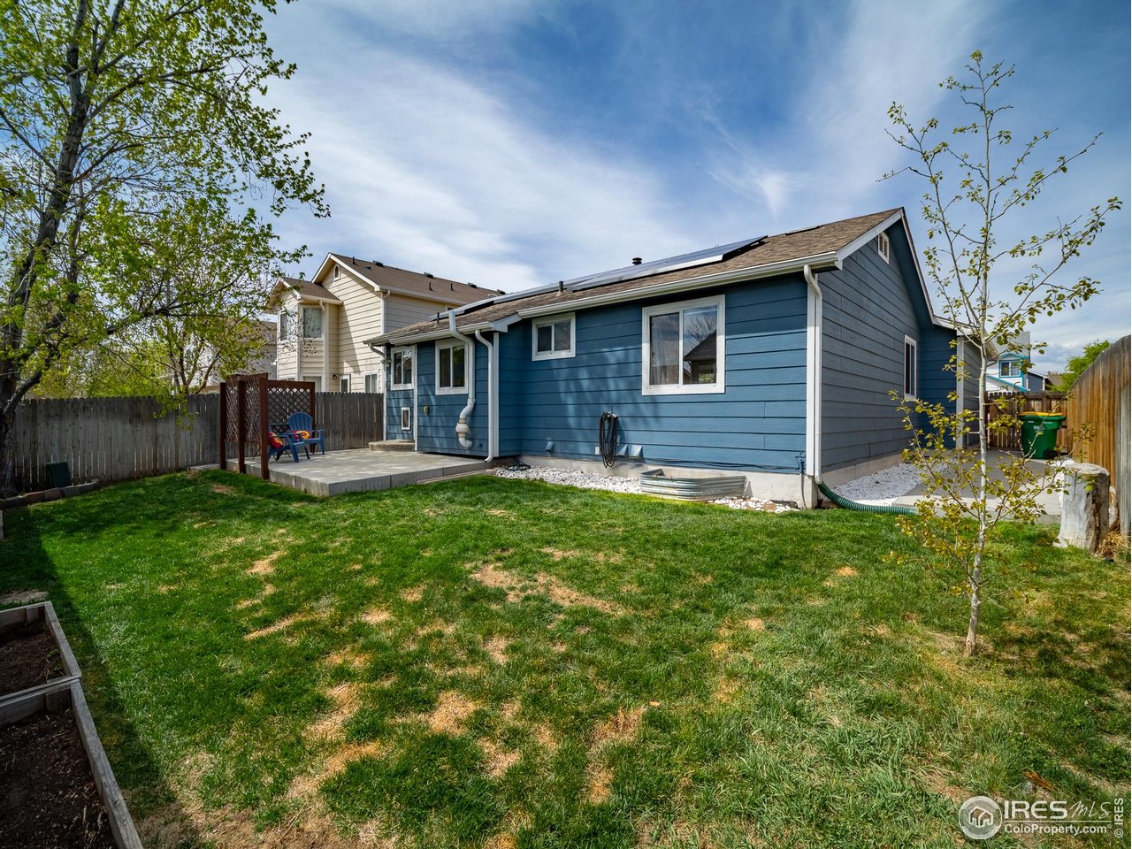 13146 Raritan Court Denver, CO 80234 - Photo 41 of 41 a front view of house with yard and outdoor seating