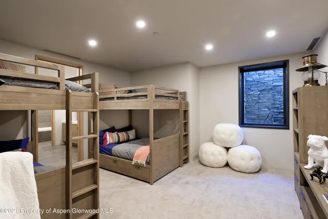 a bedroom with furniture and a couch