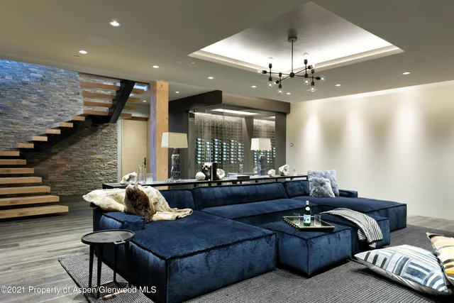 a view of a field of grass and trees