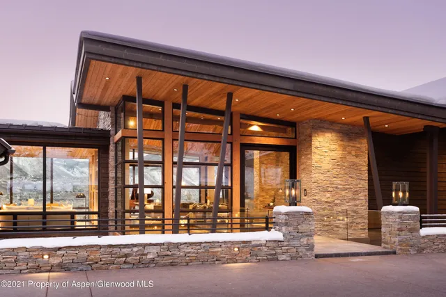 a view of a terrace with a forest
