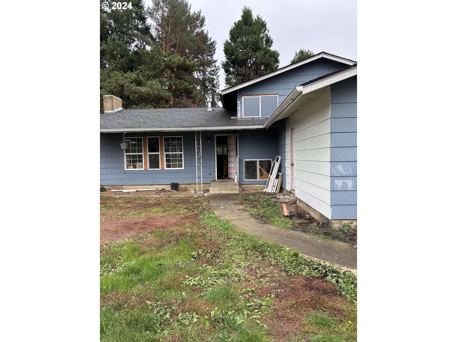17126 Southeast Bush Street Portland, OR 97236 - Photo 3 of 17 a view of a house with a yard