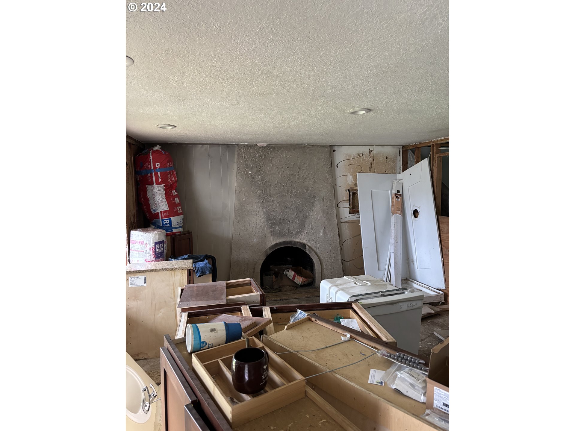 17126 Southeast Bush Street Portland, OR 97236 - Photo 5 of 17 a living room with furniture and a fireplace