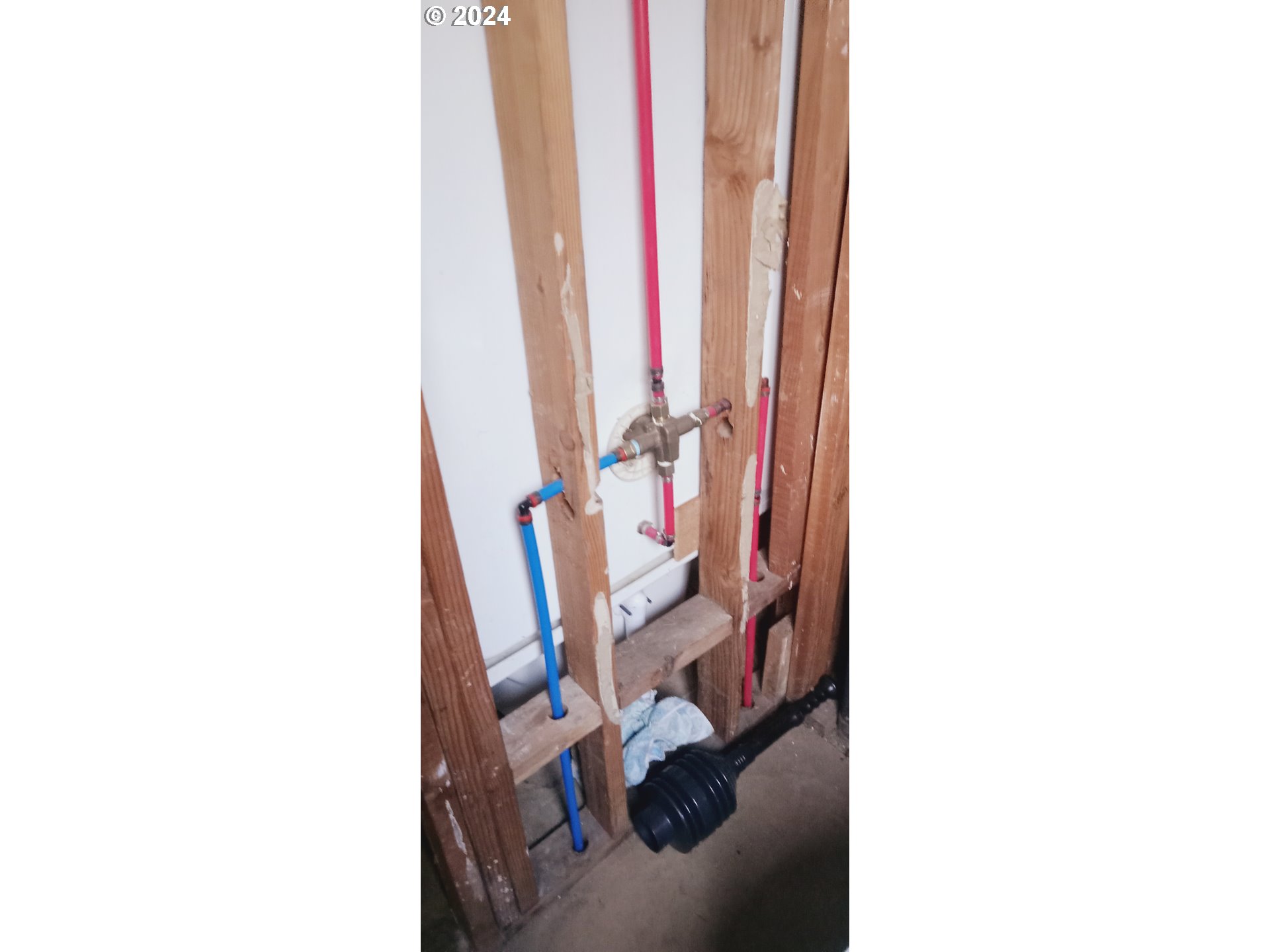 17126 Southeast Bush Street Portland, OR 97236 - Photo 10 of 17 a living room with a chair and a floor