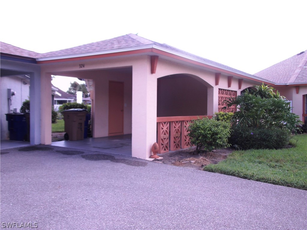 a view of a house with a garage