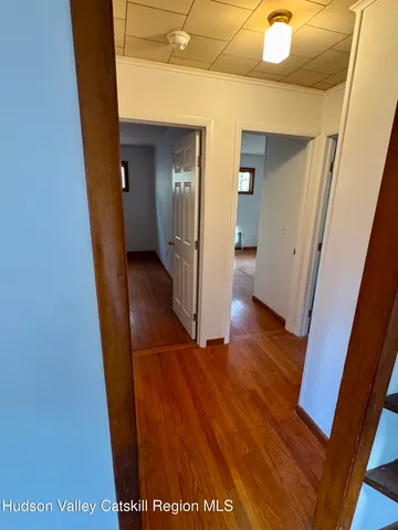 an empty room with an empty room and window