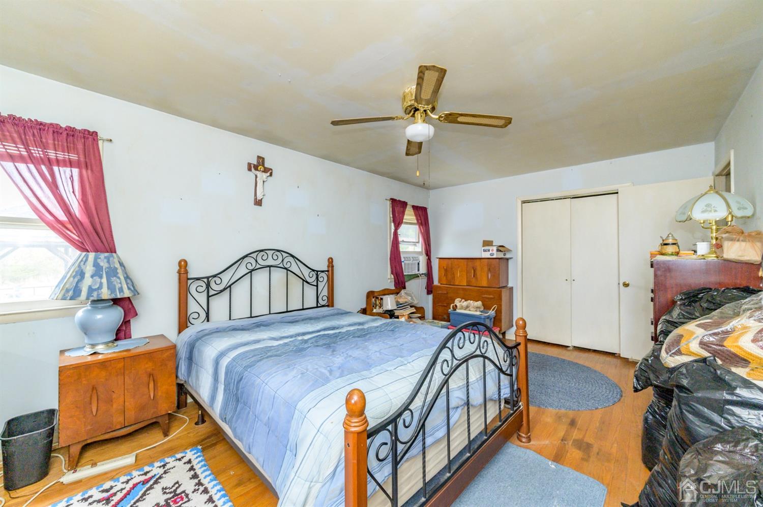 780 Monmouth Road Cream Ridge, NJ 08514 - Photo 22 of 35 a bedroom with furniture and a window