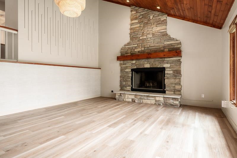 14 Terrace View Boulevard Oregon, IL 61061 - Photo 18 of 50 a view of empty room with fireplace and wooden floor