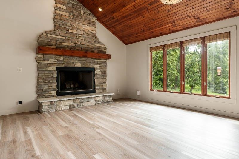 14 Terrace View Boulevard Oregon, IL 61061 - Photo 19 of 50 a view of an empty room with a fireplace and a window
