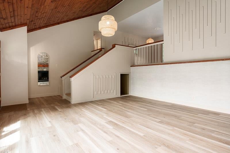 14 Terrace View Boulevard Oregon, IL 61061 - Photo 22 of 50 a view of an empty room with wooden floor and stairs