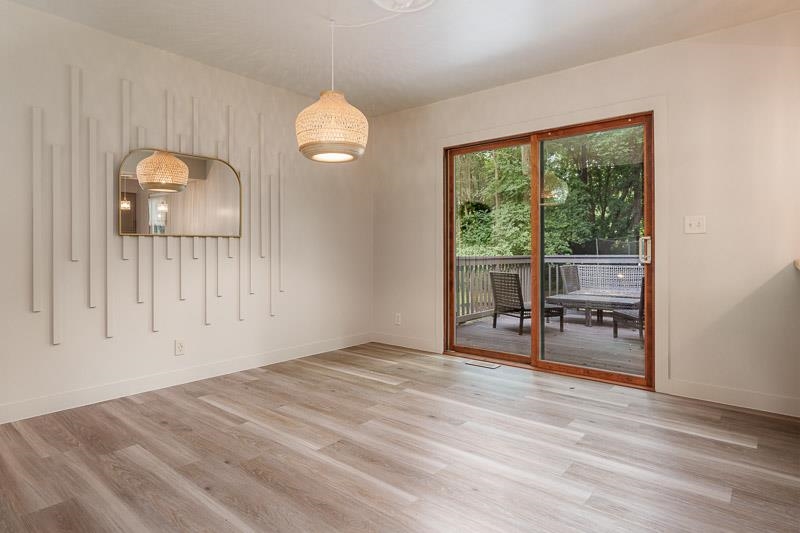 14 Terrace View Boulevard Oregon, IL 61061 - Photo 25 of 50 a view of empty room with wooden floor and fan