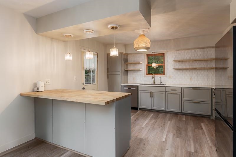 14 Terrace View Boulevard Oregon, IL 61061 - Photo 26 of 50 a kitchen with a sink cabinets and wooden floor