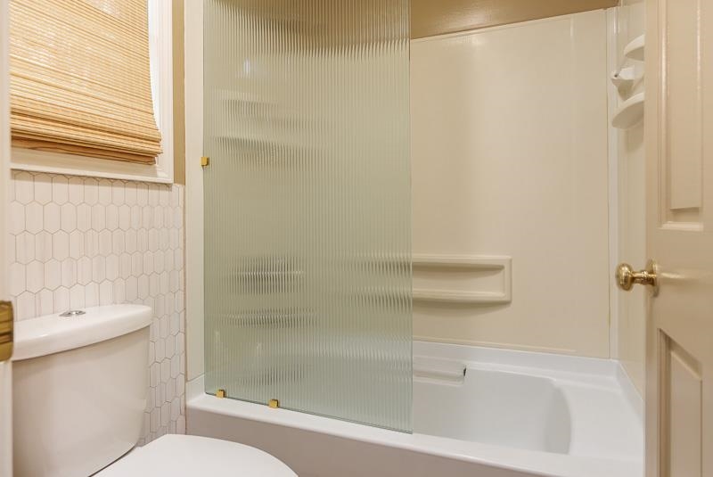 14 Terrace View Boulevard Oregon, IL 61061 - Photo 43 of 50 a bathroom with a bathtub and a sink