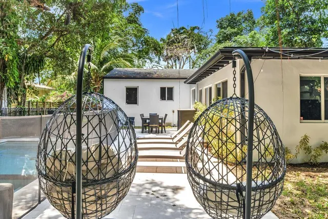 a garden view with a seating space