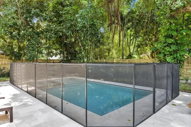 a bathroom with a white bathtub