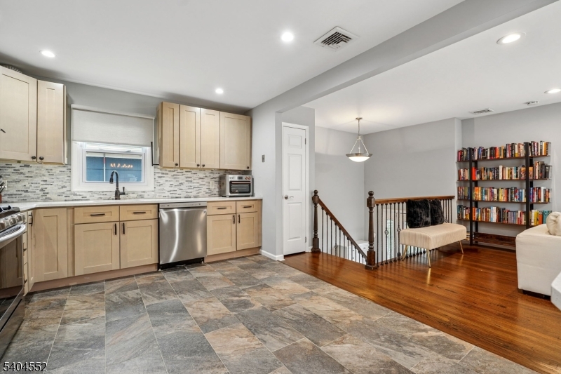 2389 Steuben Street Union, NJ 07083 - Photo 11 of 27 a kitchen with a cabinets and window