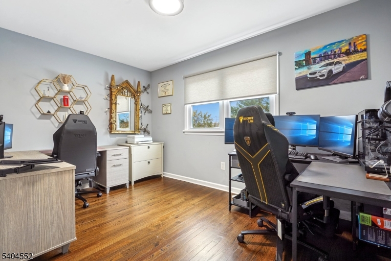 2389 Steuben Street Union, NJ 07083 - Photo 15 of 27 a view of a workspace with furniture and a window