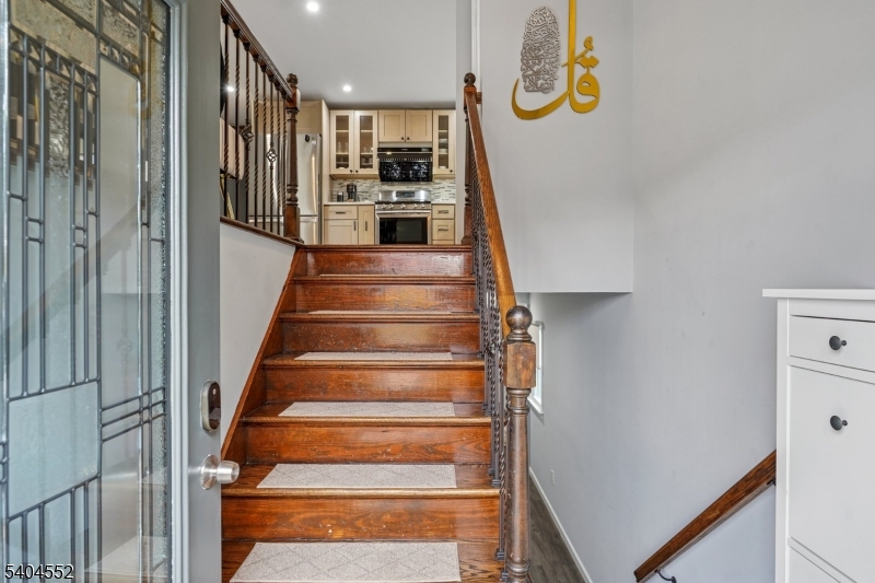 2389 Steuben Street Union, NJ 07083 - Photo 16 of 27 a view of staircase with white walls and white walls