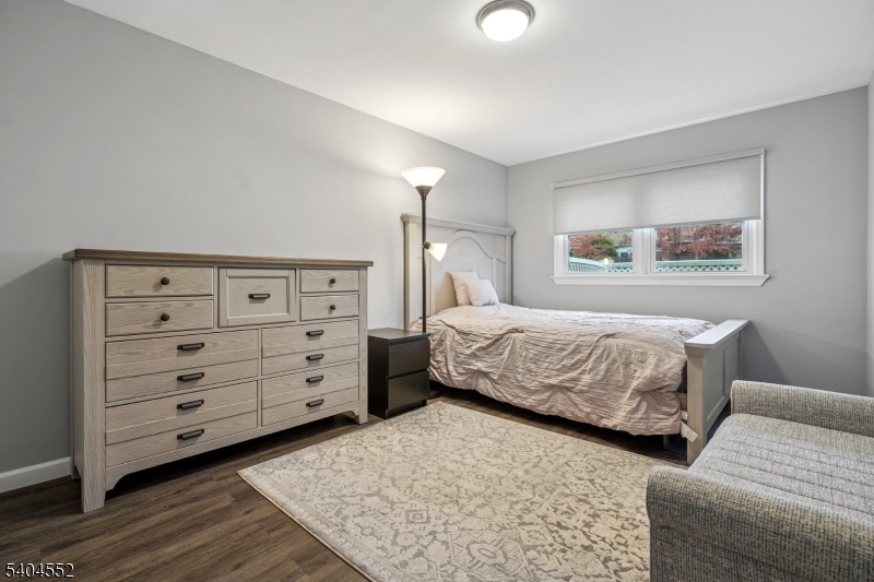 2389 Steuben Street Union, NJ 07083 - Photo 20 of 27 a bedroom with a bed and cabinet