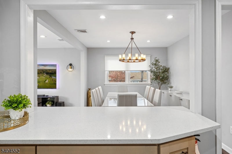 2389 Steuben Street Union, NJ 07083 - Photo 5 of 27 a view of a dining room with a table and chairs