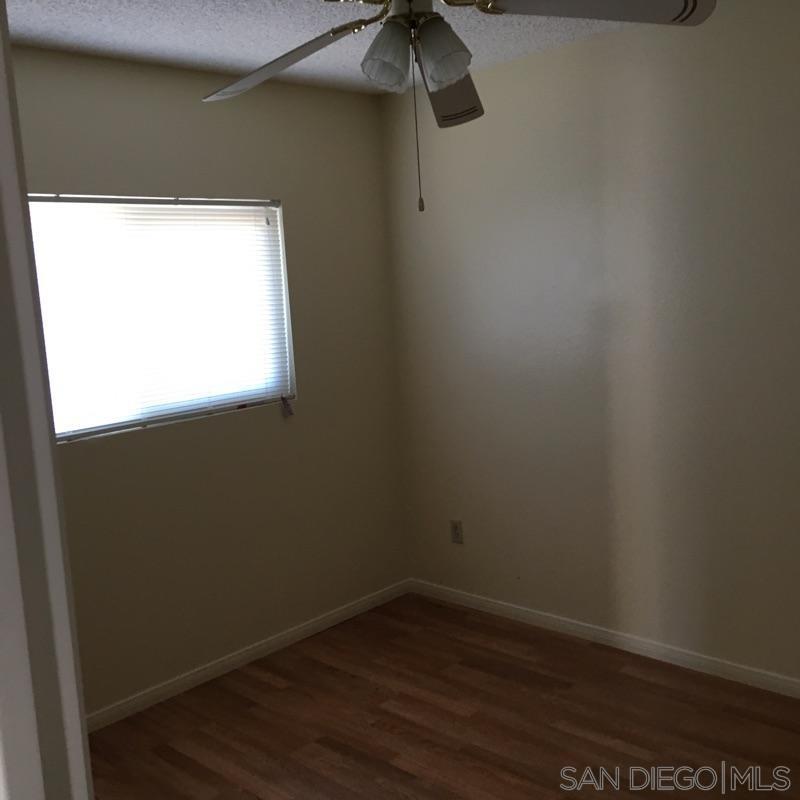 2356 Central Spring Valley Spring Valley, CA 91977 - Photo 12 of 16 a view of a small space with wooden floor and a window