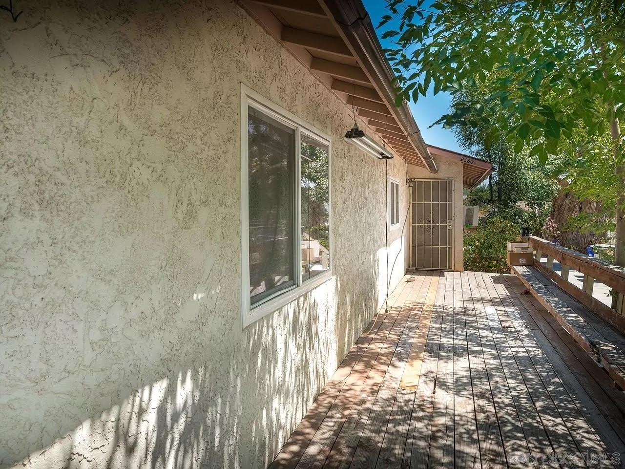 2356 Central Spring Valley Spring Valley, CA 91977 - Photo 5 of 16 a view of a house with a yard